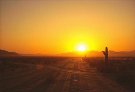 avant-garde, retro futurism , gold and chrome, california desert,sunrise, 1980s, robert T, techno style