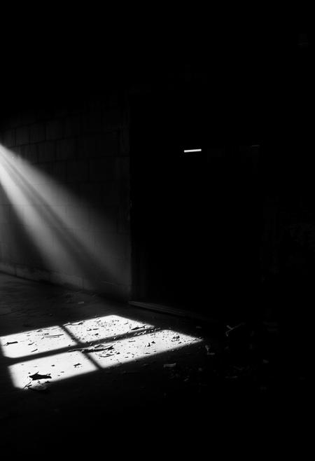 Forgotten Hopes, dramatic lights, dynamic shadows, black and white photography, extremely sad but beautiful environment