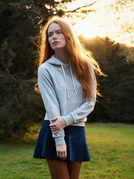 digital photo, raw photo, amateur photo, tall slim, 18yo swedish female with very long ginger shaggy hair and freckled face,BREAK, (brown seamless pantyhose:1.2), blue long hoodie, blue corduroy skirt , boots,BREAK,(holding camera:1.4),BREAK, outdoors, park, evening, dusk, sunrays, sun,, cloudy, cinematic lights, cinematic shadows, ultrarealistic, best effects, natural skin, lively gaze, best effects, detailed face, detailed skin