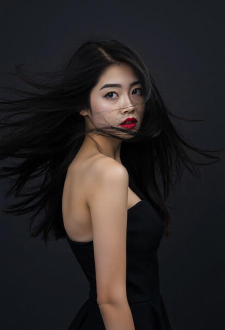 DLSR photograph, slender, beautiful  26 year old korean model . Pale skin, 
lighting<lora:MoriiMee_Gothic_Niji_Style_FLUX:0.3500000000000001> <lora:AsirAsianPhotographyflux:0.7000000000000002>
"A portrait shot of a young woman with long, voluminous, dark hair that is dramatically windswept, creating a sense of dynamic movement. She has fair skin, dark eyes, and is wearing bold, dark red lipstick. Her expression is slightly turned to the side, looking directly at the viewer with a confident and alluring gaze. She is wearing a sleeveless, dark-colored dress with a fitted bodice and a flared skirt that is partially visible. The background is a muted, dark gray, which emphasizes her figure and the dramatic flair of her hair. The lighting is focused, highlighting her features and the texture of her hair and dress. The overall mood is elegant and captivating."
