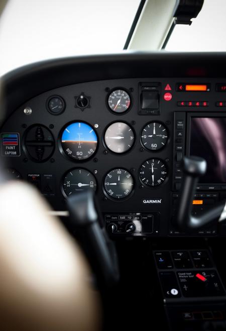 A beautifully composed professional photograph of a Cessna 172 instrument panel after a full Garmin upgrade, GTN750xi ,G5, G1000