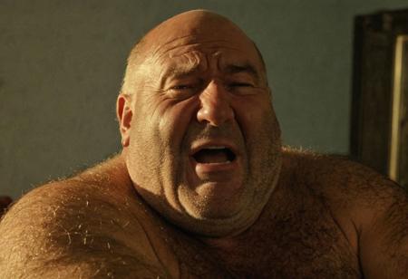 Erotica, erotic sensual movie scene, Hazey atmosphere, Volumetric Lighting, light depth, dramatic atmospheric lighting, , closeup of old hairy tanned man having an intense orgasm, bald, chubby puffy cheeks, doublechin, shaved shaven face, stubble, extremely hairy chest, hairy belly, hairy arms, hairy shoulders, blonde hair, small mans gold earrings, (rocker, biker, trucker), ((massive hairy tits, huge hairy boobs))