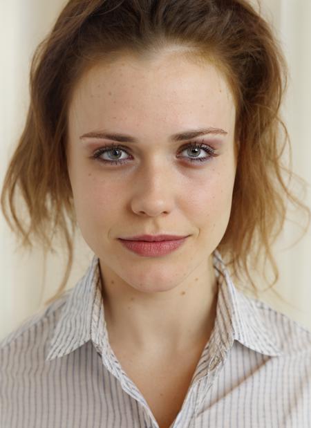 professional photography, portrait of a woman in striped shirt, in the office, bold, bright colours, (high detailed skin:1.1)
 <lora:jennie_jacques_lora_v01:1> jenjac