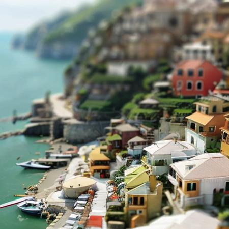 seaside village, fishing boats, cars <lora:tilt-shift:1>