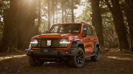a gwm txxx parked in the middle of forest, sunset light across the leaves, Tyndall effect,  clear background, beautiful, hd, 8k, (photographic:1.5), magnificent, grandiose, mac os wallpaper  <lora:GWMTank300_V2.0:1>