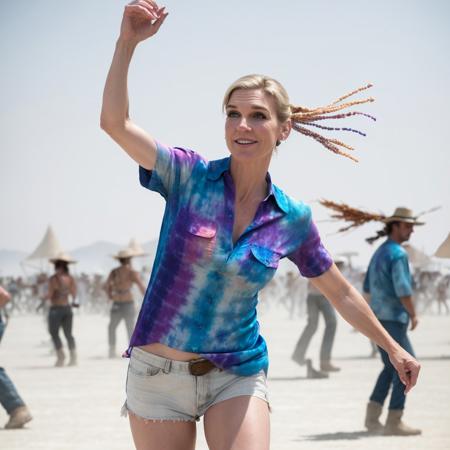 RAW photo of young woman Kim Wexler <lora:kimberlyKimWexlerRhea_v10:0.9> dancing at burningman festival, tiedye shirt, 8K, high resolution, highly detailed, freckles, skin pores, photo by some famous award winning photographer