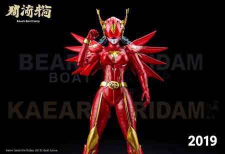 Center stage stands the Cyber Angel woman Dakini, vibrant in red and gold, poised for action with one arm uplifted. Her helmet, bearing a red visor and gold emblem, matches the striking color scheme. The backdrop, Bear's Boot Camp, provides a stark contrast. Top left, "Kamen Rider" is inscribed, while the bottom right corner reads "2019". The figurine, in high resolution, is the focal point, exuding energy and movement with its dynamic pose. The contrasting colors, text, and background offer context and intrigue. The image is a celebration of the character and anime, enhanced with vivid emotions, sharp details, and captivating lighting.