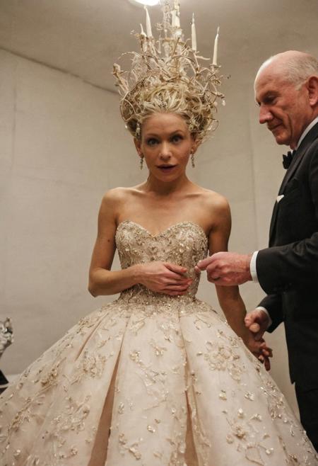 Perfect candid photograph of a goblin being fitted for the most elegant and expensive dresses at "Bergdorf Goodman", 
<<BREAK>> ,
((very strong fisheye-lens photograph (very intense fisheye-view photograph), (very low upward looking angle), intricately detailed, very detailed background, (contrats in lifestyle photograph), creepy lighting, creepy cinematic photo), realisticvision-negative-embedding,  epiCRealism ))