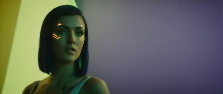 cinematic film still of  <lora:perfection style:0.3>
 <lora:detailed:0.1>
 <lora:Chiaroscuro Lighting Style:0.3>
 <lora:cyberpunk style v2:0.9>
 <lora:Cyberpunk Style:0.1>
In Cyberpunk city a woman with a neon triangle on her face,1girl,solo,looking at viewer,black hair,hair ornament,jewelry,yellow eyes,upper body,flower,tattoo,makeup,facial mark,purple background,bouquet,realistic,neon lights , science fiction, futuristic setting, detailed background, dramatic light, dramatic shadow light, contrast, cinematic color, cinematic look, filmic, realistic, realism, perfection, perfect, different, cinematic, film, cinematography, artstation, Cyberpunk city style, Cyberpunk style, shallow depth of field, vignette, highly detailed, high budget, bokeh, cinemascope, moody, epic, gorgeous, film grain, grainy