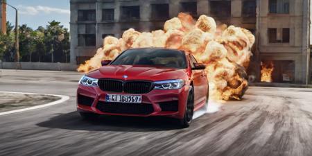 a red bmw m5 driving away from an explosion with flames and an urban background, asphalt street, action stunt, movie, 8k uhd, hdr, high quality, cinematic lighting, 4k, 8k, (ultra-realistic:1.1), high-resolution, shot on Canon 5D, DSLR, 30mm <lora:bmw_m5:1>