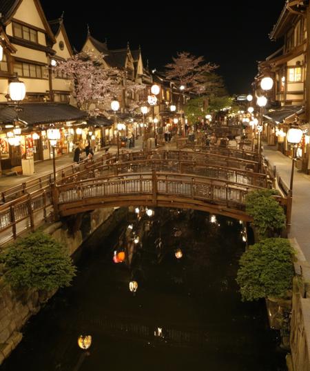 , <lora:taisyu_sakaba_SDXL_V2:1> sakaba, indoors, japan, scenery,    a grand capital city nestled in the heart of a magical realm inspired by Dungeons and Dragons. The city stands as a testament to both architectural splendor and mystical enchantments. The streets are bustling with life, filled with a diverse array of creatures, both human and fantastical, going about their daily routines. The buildings showcase a harmonious blend of traditional medieval design and whimsical magical enhancements. Ornate bridges span over flowing rivers and canals, connecting various districts of the city. Gardens and parks are interspersed throughout, teeming with vibrant, otherworldly flora and fauna. In the central square, a magnificent fountain serves as a gathering place, its waters sparkling with magical energies.
