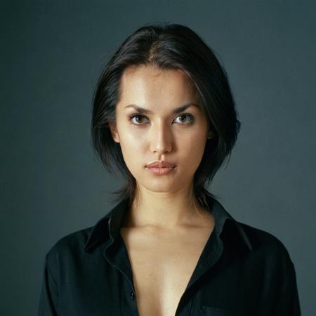 portrait photo of M02AWA, looking at viewer, glamour makeup, black shirt, black background, shot on Kodak Portra 400 film