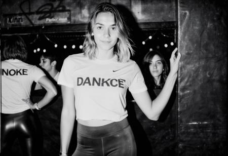 KB_winenol, instagram photo, portrait photo of 19 y.o english woman, cropped tshirt, tight leggings, in a smokey nightclub, dancing, perfect detailed eyes, natural skin, hard shadows, film grain