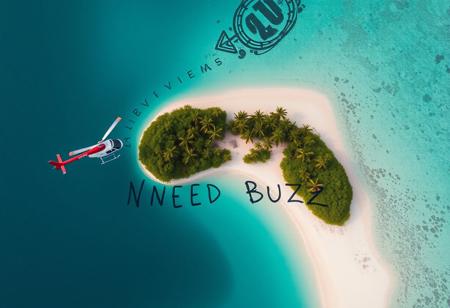 Helicopter aerial view of tropical desert island beach where there is written text by a survivor "NEED BUZZ"